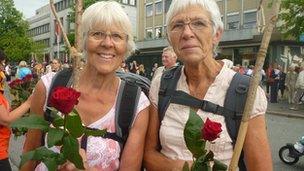 Inga Juul, 67, and Inger Nore Rauan, 67, carried traditional wooden sticks and celebratory roses