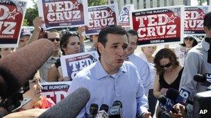 Ted Cruz surrounded by reporters in Houston, Texas 31 July 2012