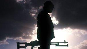 Silhouette of a Kurdish fighter