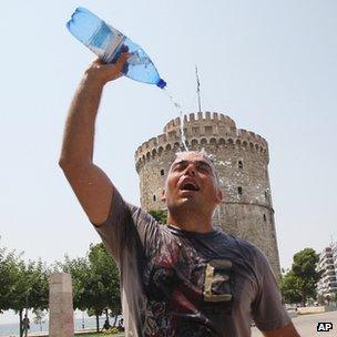 Man pours water on head