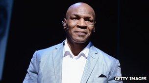 Mike Tyson takes part in a curtain call following his Mike Tyson: Undisputed Truth opening night in New York City 2 August 2012