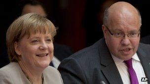 Chancellor Angela Merkel and environment minister Peter Altmaier