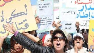 Protesters stage a sit-in outside a local court in Earache, Morocco, where a judge ordered 16-year-old Amina Filali, to marry the man who had raped her, in order to preserve her family's honour. She later committed suicide (15 March 2012)