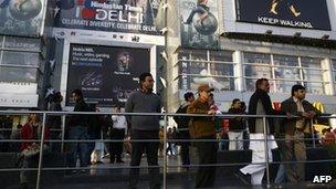People outside a shopping mall in India