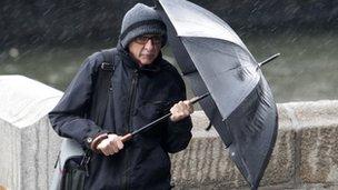 A man holding an umbrella