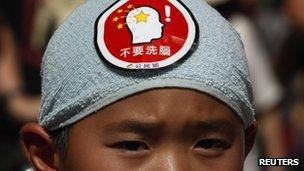 File photo: A child protesting in Hong Kong against Chinese patriotic education in July