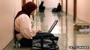 A Muslim using a computer
