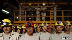 Miners at Italy's Carbosulcis coal mine in Sardinia on 29 August 2012