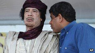 Abdullah al-Senussi with Col Gaddafi in 2009