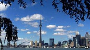 The CN Tower and the Skydome highlight the Toronto skyline in his undated file photo.