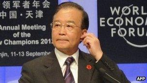 Chinese Premier Wen Jiabao prepares to deliver his keynote address at the World Economic Forum in Tianjin on September 11, 2012