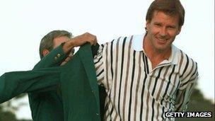 Sir Nick Faldo receives the green jacket for winning the 1996 Masters, the third time he won the title