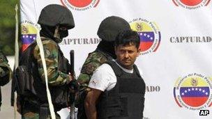 Martin Llanos escorted by Venezuelan soldiers in February 2012