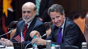 US Treasury Secretary Timothy Geithner (R) talks with US Federal Reserve Chairman Ben Bernanke during a meeting of US-India Economic and Financial partnership with India Finance Minister P. Chidambaram in New Delhi on October 9, 2012.