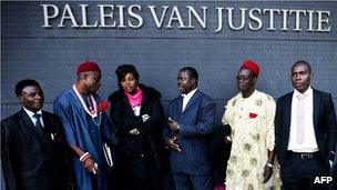 Nigerian farmers and their legal team at the law courts in The Hague. 11 Oct 2012