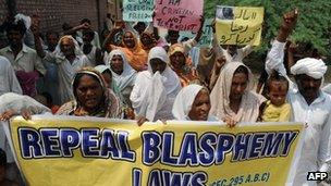 Pakistani Christian villagers march during a protest against the country's blasphemy laws, 30 August 2012