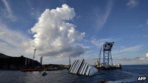 The Costa Concordia cruise ship lies near the harbour of Giglio on 14 October 2012