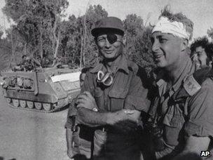 Moshe Dayan and Ariel Sharon on the west bank of the Suez Canal (18 October 1973)