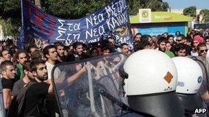 Police clash with leftist protesters at the city of Heraclion on the island of Crete on October 28