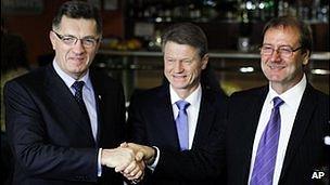 Lithuania's Social Democrat party leader Algirdas Butkevicius, left, Order and Justice party leader Rolandas Paksas, centre, and Viktor Uspaskich, right, leader of the Labour Party