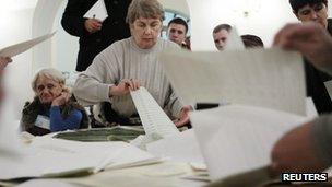 Election workers count votes in Kiev, 28 October