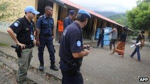 File photo: East Timorese police with members of the UN police
