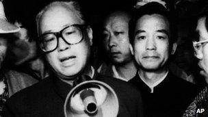 Chinese Communist Party (CPC) Secretary General Zhao Ziyang (L), accompanied by Wen Jiabao (2nd R) addresses the student hunger strikers in one of the buses at Tiananmen Square in Beijing, 19 May 1989