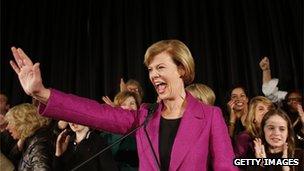 Tammy Baldwin waves to supporters