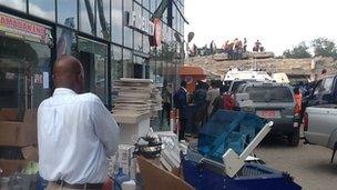 Bank employees moving property out of the Fidelity Bank
