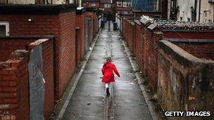 Child in Manchester back street