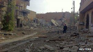 Damaged buildings in the city of Deir al-Zour, 13 November 2012