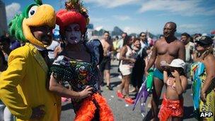 A transvestite poses at Rio's gay pride in Copacabana