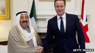 Emir of Kuwait Sheikh Sabah al-Ahmad al-Jaber al-Sabah (L) and British Prime Minister David Cameron