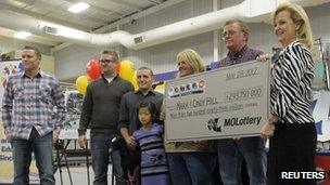 Mark and Cindy Hill claim their share of the Powerball jackpot in Dearborn, Missouri 30 November 2012