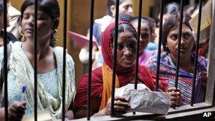 Unemployed educated Indian women wait to register themselves at the Employment Exchange Office in Allahabad, India.