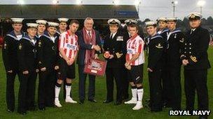 HMS Defender crew and Exeter City players meet. Pic: Royal Navy