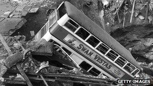 A double decker bus in a bomb crater in Balham