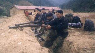 File photo of Maoist rebels in Nepal (2004)