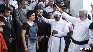 Chief Justice Shirani Bandaranayake is blessed by priests before her appearance in parliament on Tuesday