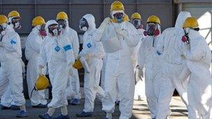 Tepco workers at the Fukushima nuclear power plant on 12 February 2012