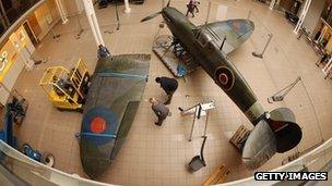 Spitfire being dismantled at the Imperial War Museum in London