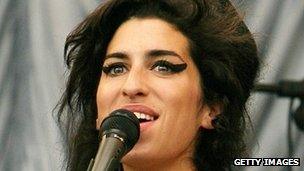 British pop singer Amy Winehouse performing at the Glastonbury music festival in 2007