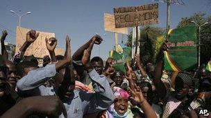 Malians protest in favour of an international military intervention to regain control of the country's Islamist-controlled north, in Bamako, Mali, Saturday, Dec. 8, 2012.