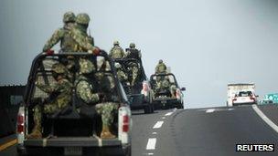 Mexican marines ride in convoy