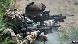 Service personnel return fire in Afghanistan