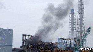 Smoke is seen coming from the area of the No. 3 reactor of the Fukushima Daiichi nuclear power plant