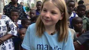 Martha Payne with children in Malawi