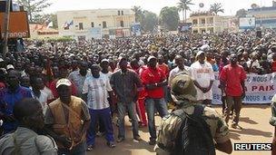Residents of Bangui listen to an appeal for help by CAR President Francois Bozize. 28 Dec 2012