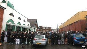 Mourners pray as they attend the funeral at a Mosque in High Wycombe of two young brothers that were killed in a car crash on the M6 on Christmas Day.