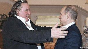 Russian President Vladimir Putin (R) greets French actor Gerard Depardieu in Sochi, 5 January